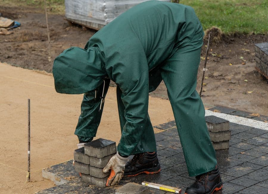 Landscape work on a live jobsite, the scope Ruh estimates from the drawings